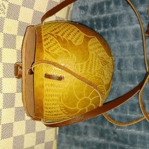 Carved coconut crossbody bag